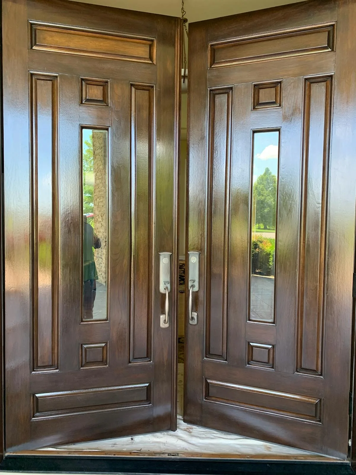 Wood entry doors with narrow decorative glass panels