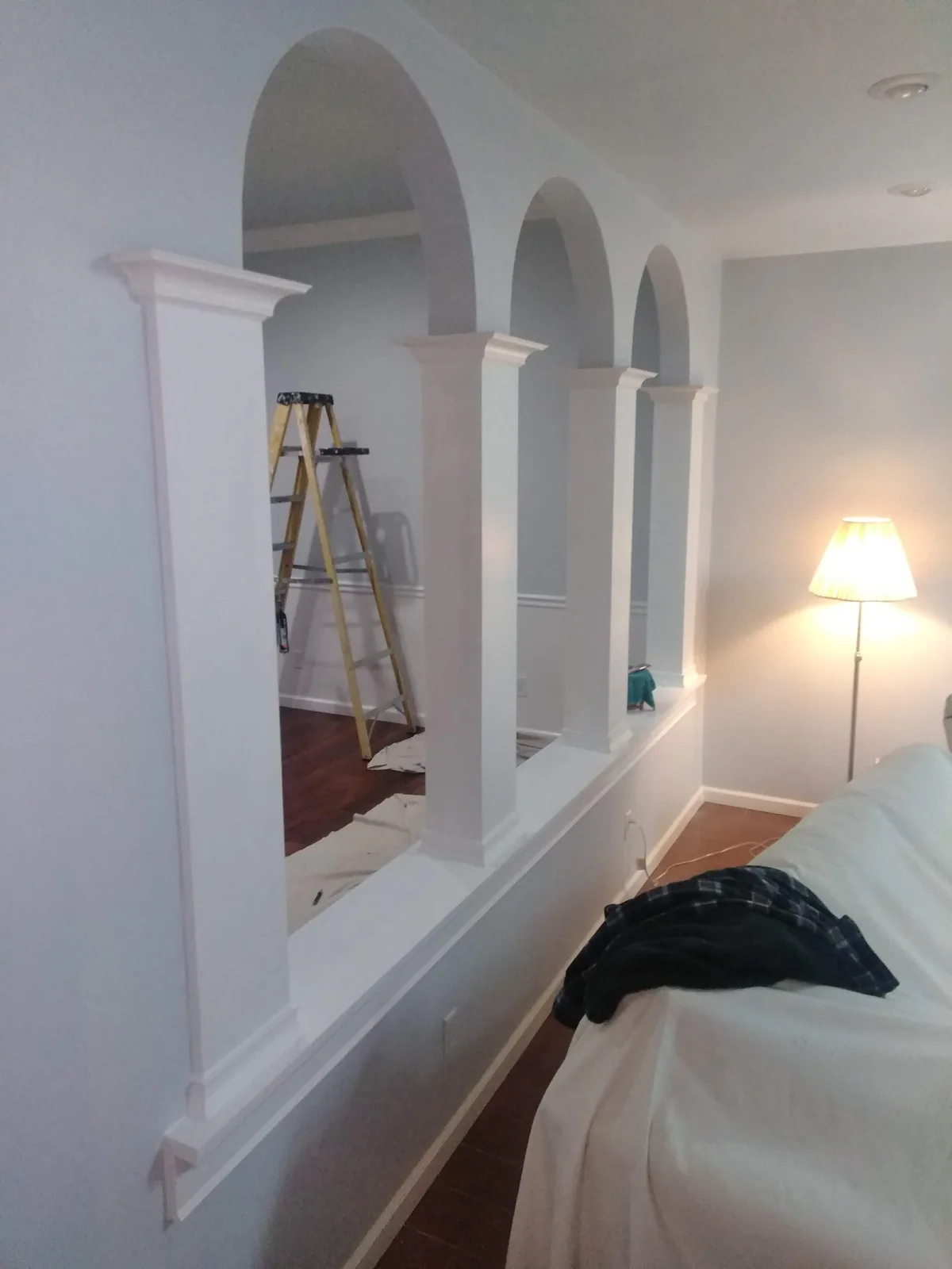 Interior arches, columns and trim during finishing work